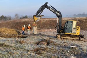 Mechanical Stripping Of Grave Sites