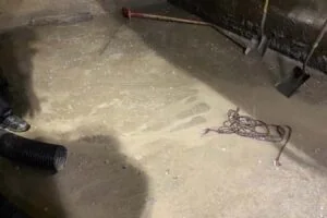 Vacuum Removal of Rock and Sand From Hopper Pit